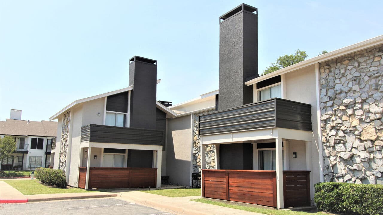 The garden-villa buildings and mature trees at Bay Island